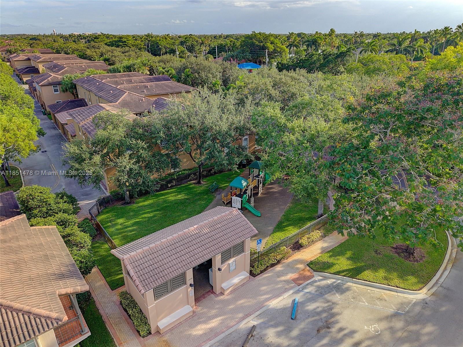 14774 Southwest 10th Street, Unit 10502 Pembroke Pines, FL 33027 - Photo 36 of 40 an aerial view of a house with a yard