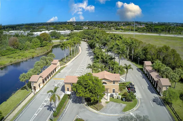 a view of a lake with a yard