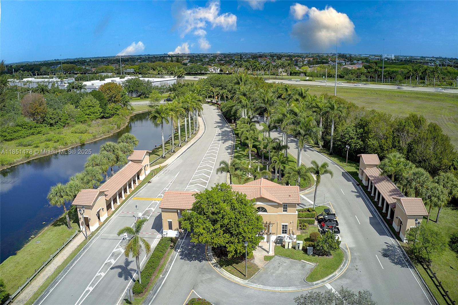14774 Southwest 10th Street, Unit 10502 Pembroke Pines, FL 33027 - Photo 39 of 40 a view of a lake with a yard