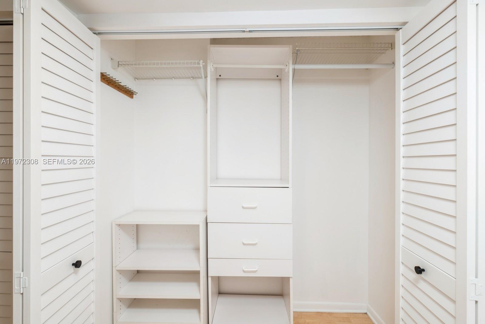 540 Brickell Key Drive, Unit 504 Miami, FL 33131 - Photo 26 of 31 a view of walk in closet