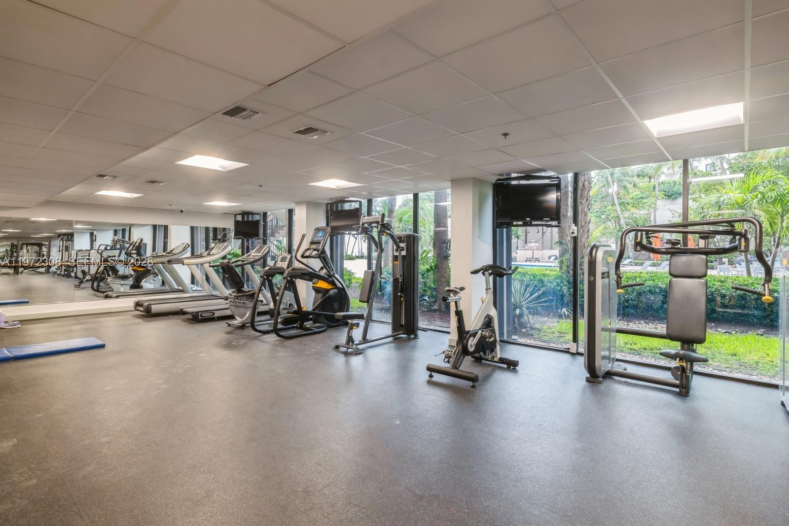 540 Brickell Key Drive, Unit 504 Miami, FL 33131 - Photo 8 of 31 a view of a room with gym equipment