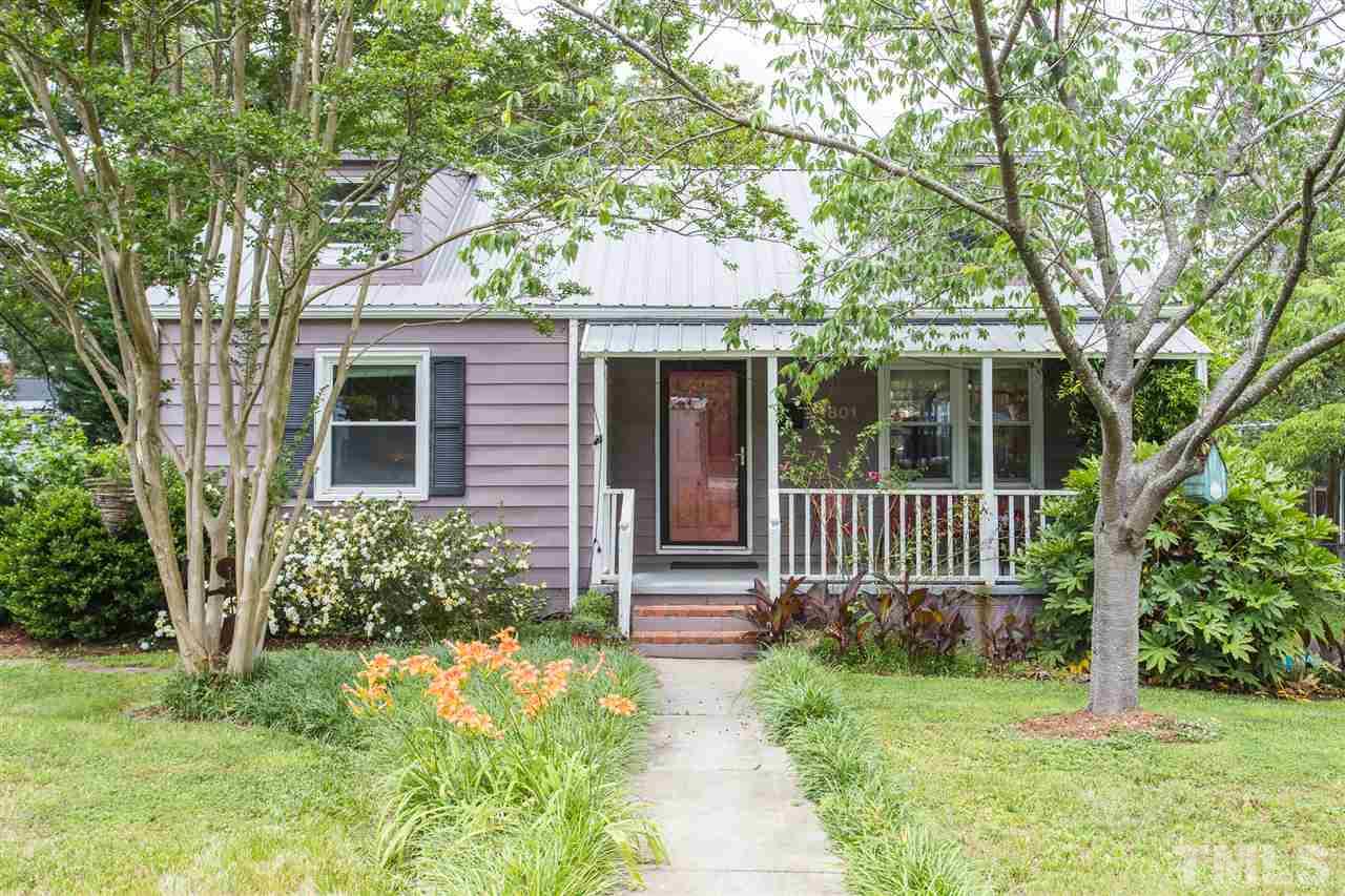 1801 Rankin Street Raleigh, NC 27604 - Photo 1 of 3 a front view of a house with a yard