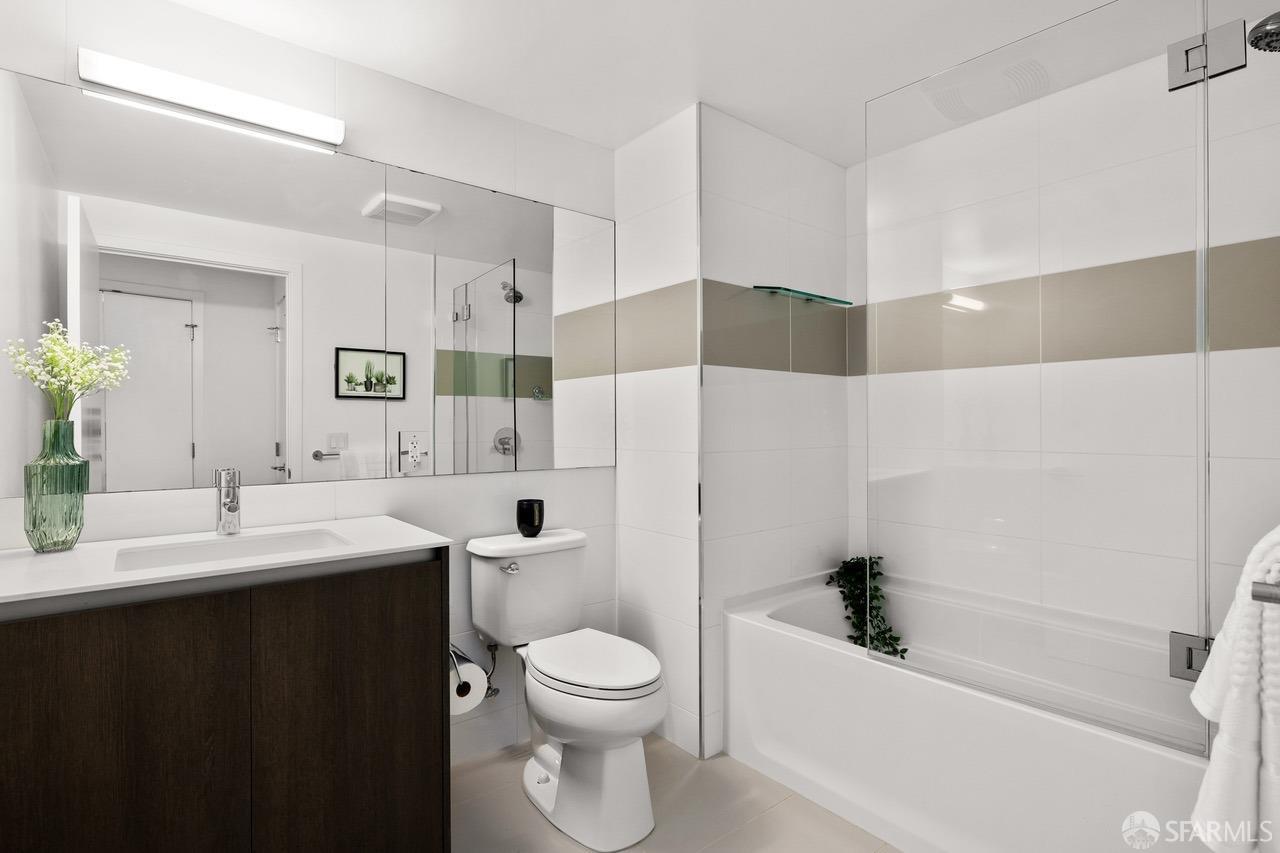 8 Buchanan Street, Unit 200L San Francisco, CA 94102 - Photo 14 of 27 a bathroom with a sink a toilet and shower