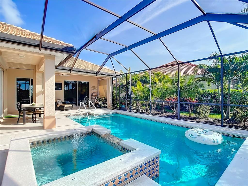 114 Rimini Way North Venice, FL 34275 - Photo 34 of 54 a view of a swimming pool with a patio