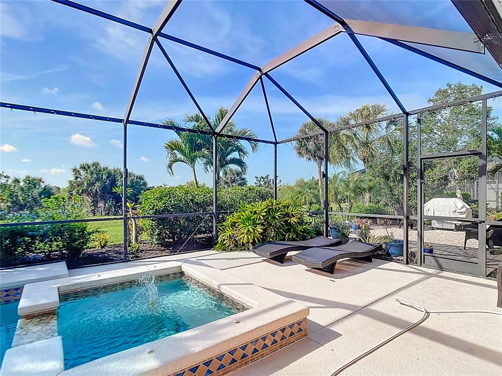 114 Rimini Way North Venice, FL 34275 - Photo 35 of 54 a view of yard with patio