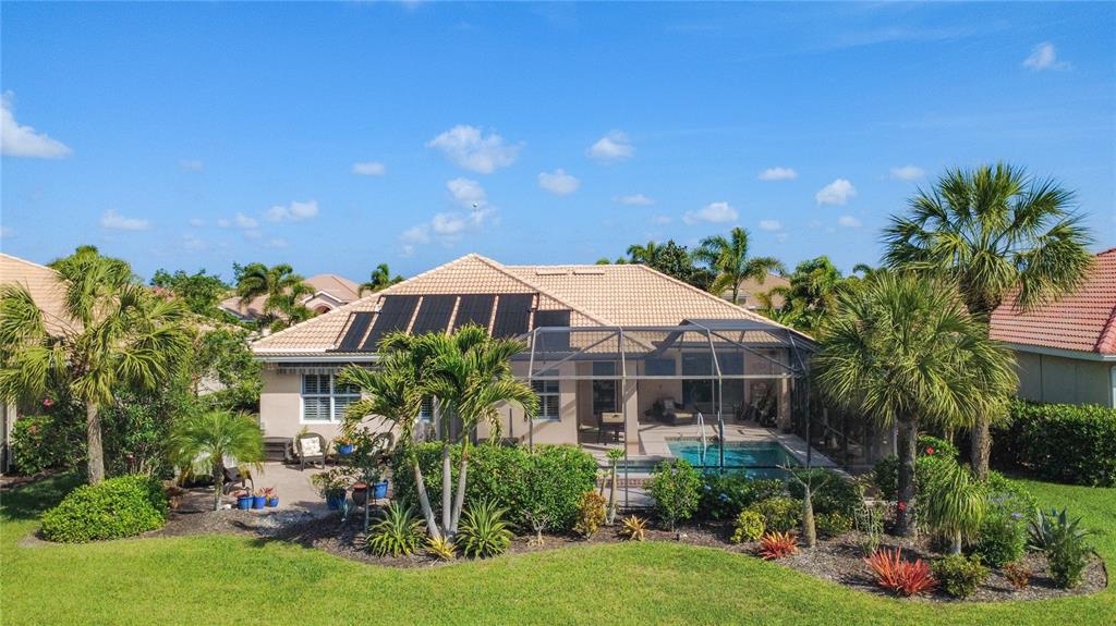 114 Rimini Way North Venice, FL 34275 - Photo 36 of 54 a front view of a house with a yard