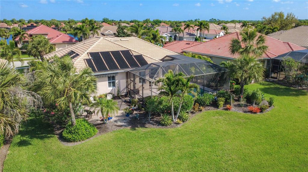 114 Rimini Way North Venice, FL 34275 - Photo 37 of 54 an aerial view of a house with yard swimming pool and outdoor seating