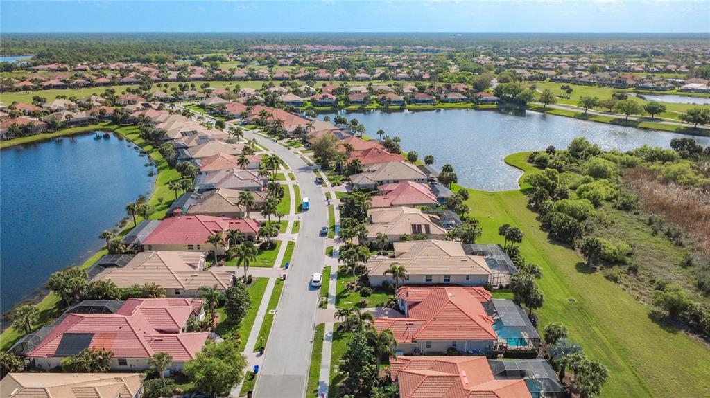 114 Rimini Way North Venice, FL 34275 - Photo 43 of 54 an aerial view of residential houses with outdoor space