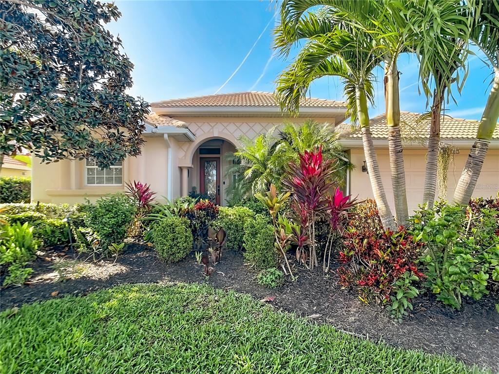 114 Rimini Way North Venice, FL 34275 - Photo 54 of 54 a view of a potted plants in front of house