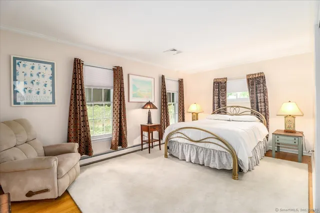 a bed room with a bed and a couch