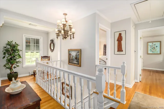 a view of a dining room with furniture wooden floor and livingroom view