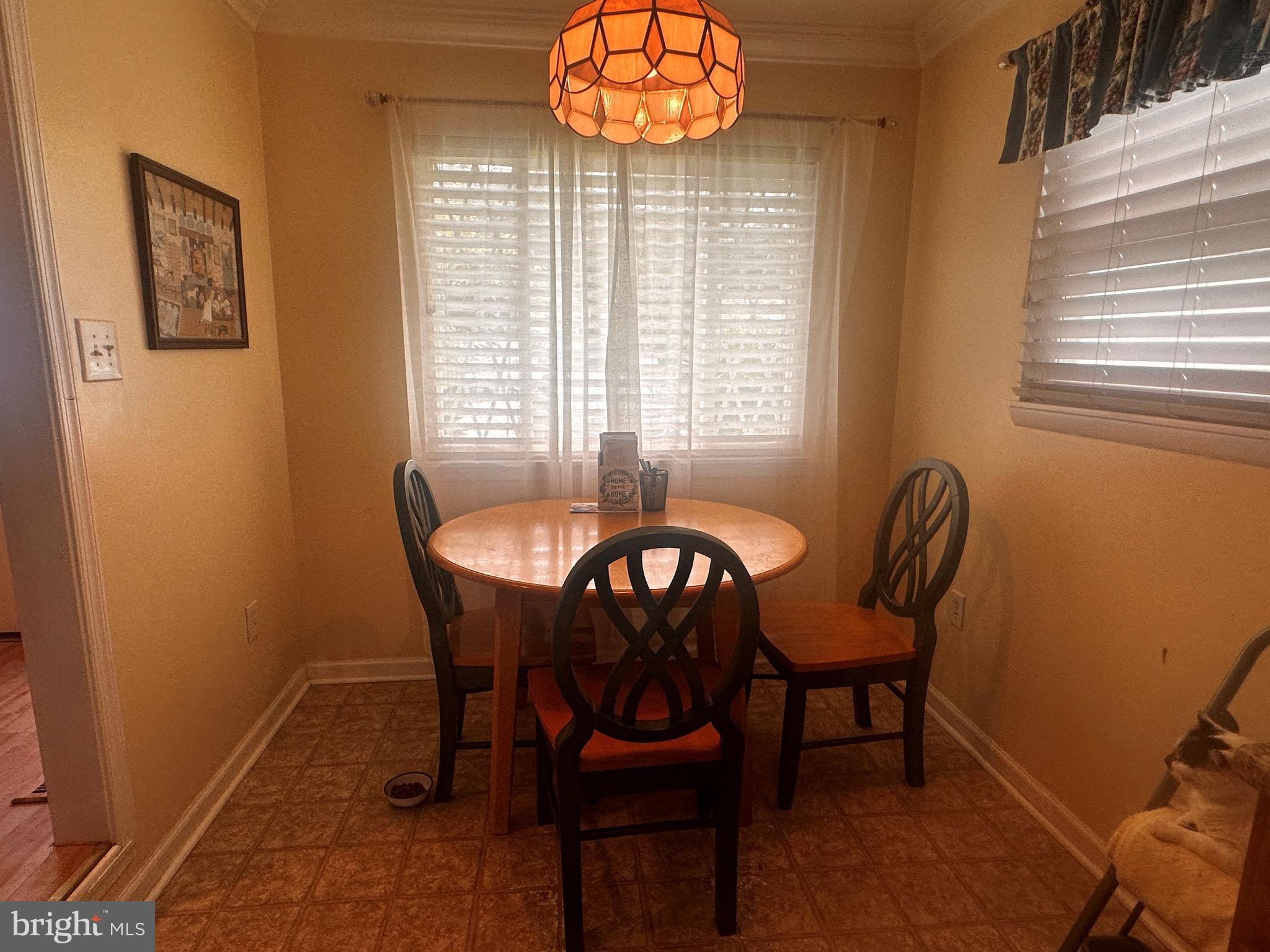 119 Redbud Road Edgewood, MD 21040 - Photo 2 of 31 a view of a dining room with furniture and chandelier