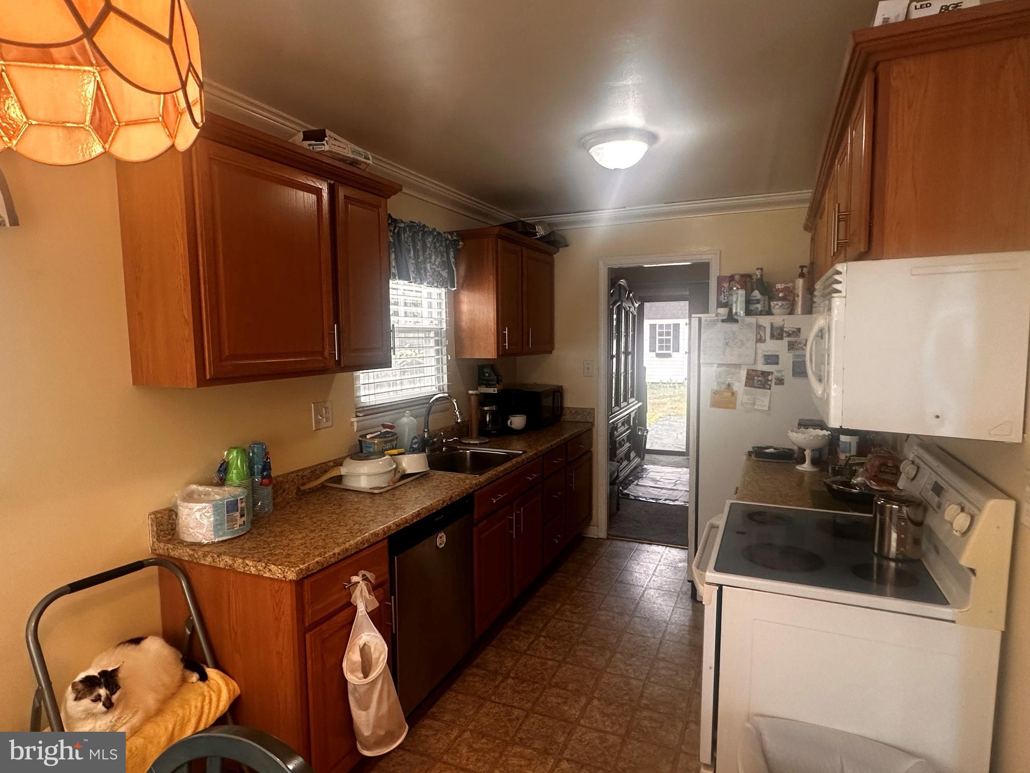 119 Redbud Road Edgewood, MD 21040 - Photo 3 of 31 a kitchen with granite countertop a sink a stove and refrigerator