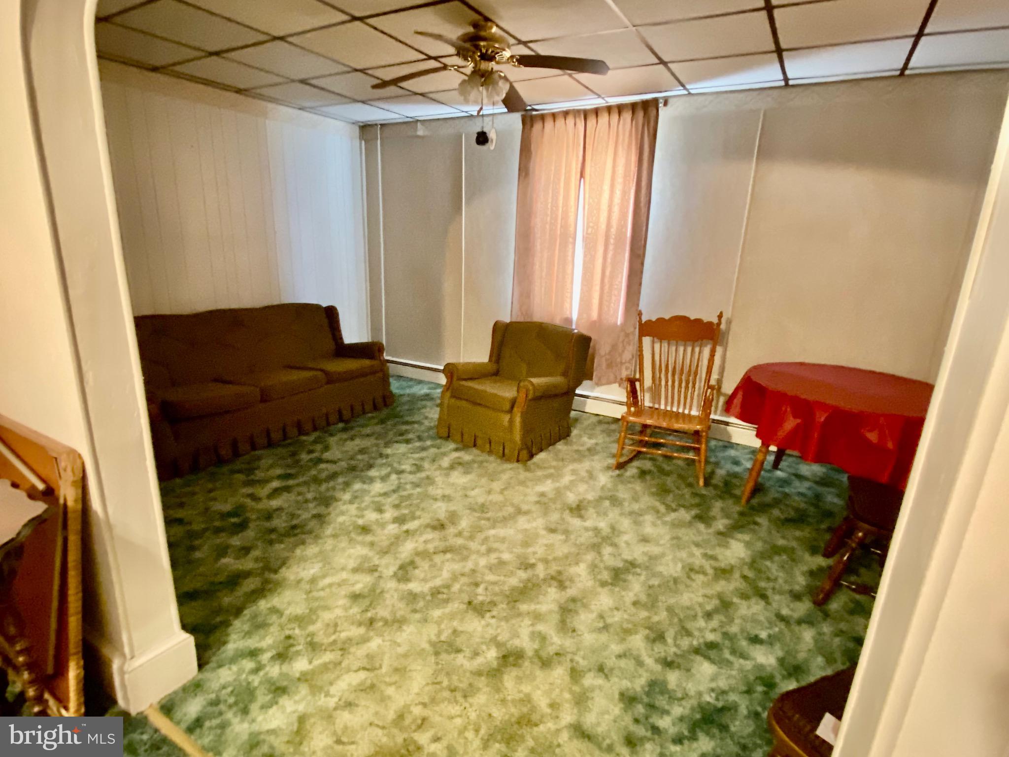 128 Barry Road Ashland, PA 17921 - Photo 11 of 19 a living room with furniture and a rug