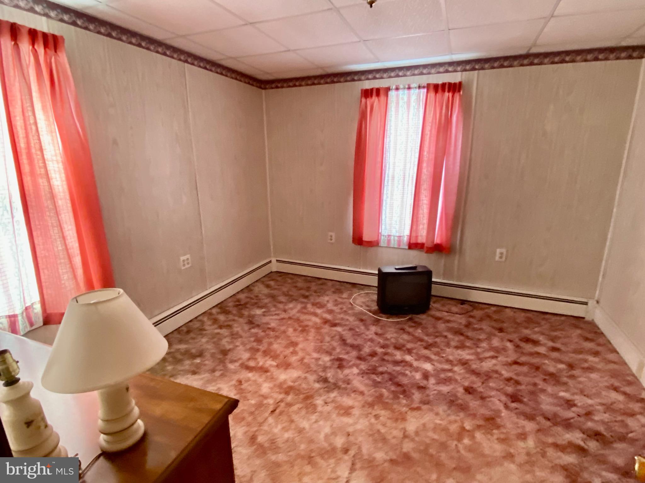 128 Barry Road Ashland, PA 17921 - Photo 16 of 19 a view of a room with window and wooden floor