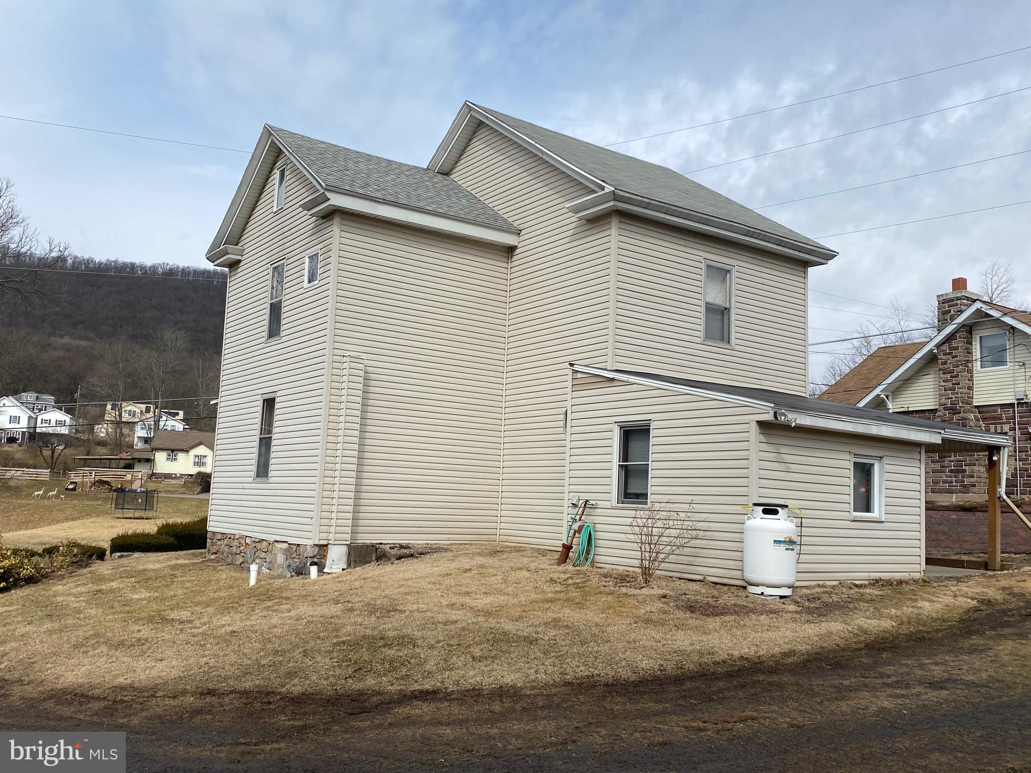 128 Barry Road Ashland, PA 17921 - Photo 3 of 19 a view of a house with a yard