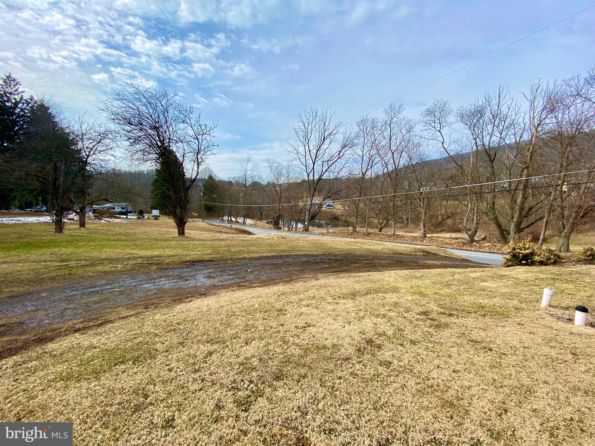 128 Barry Road Ashland, PA 17921 - Photo 4 of 19 a view of road with large trees