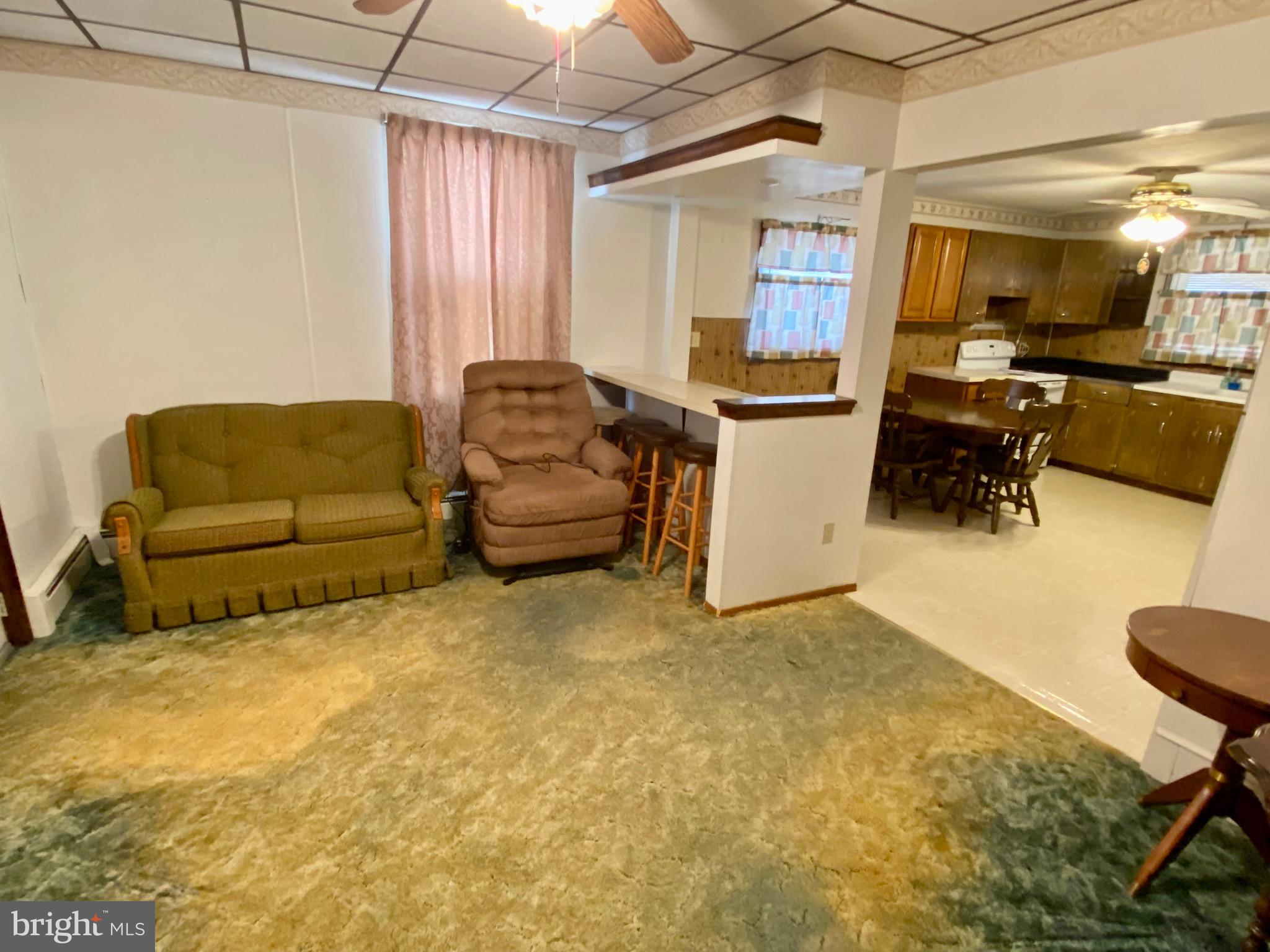 128 Barry Road Ashland, PA 17921 - Photo 10 of 19 a living room with furniture and a table