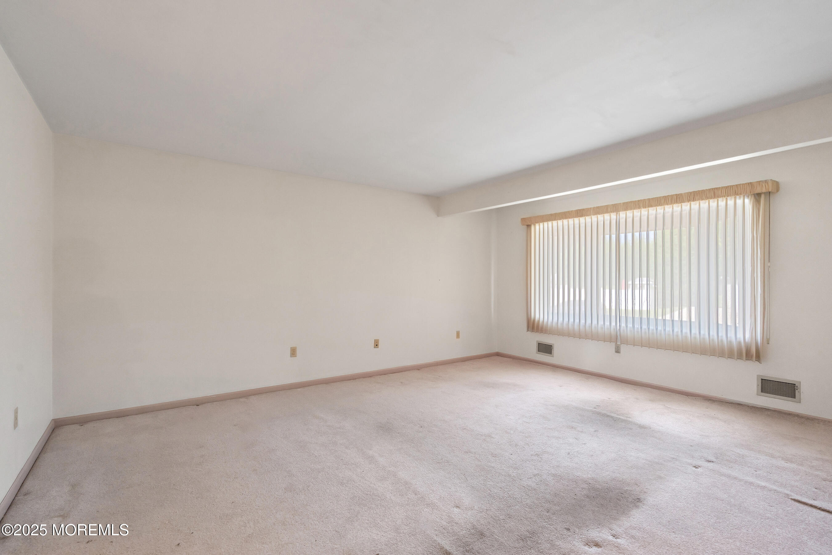 6 Kim Valley Road Hamilton, NJ 08620 - Photo 1 of 27 a view of an empty room with a window