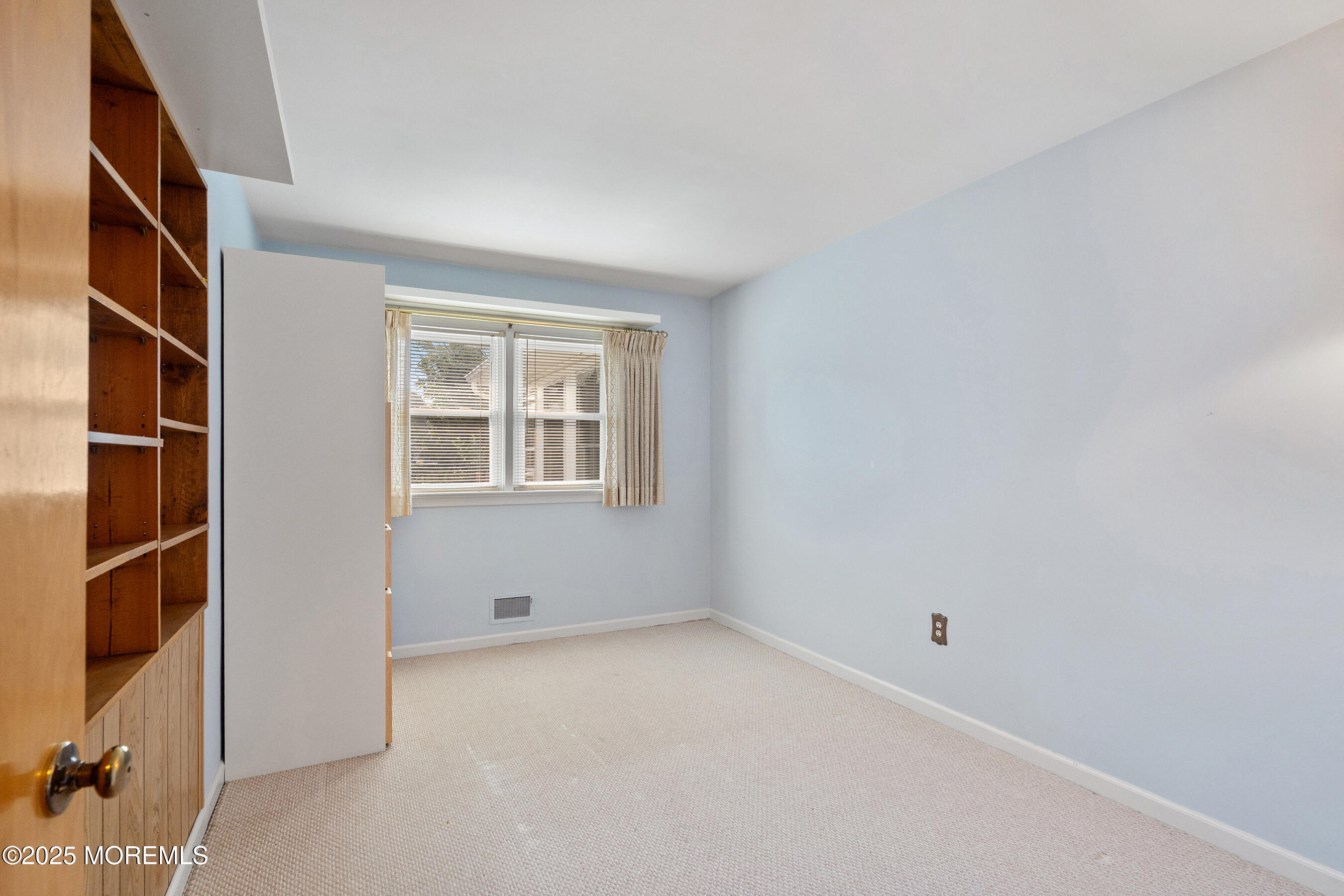6 Kim Valley Road Hamilton, NJ 08620 - Photo 11 of 27 a view of an empty room with a window
