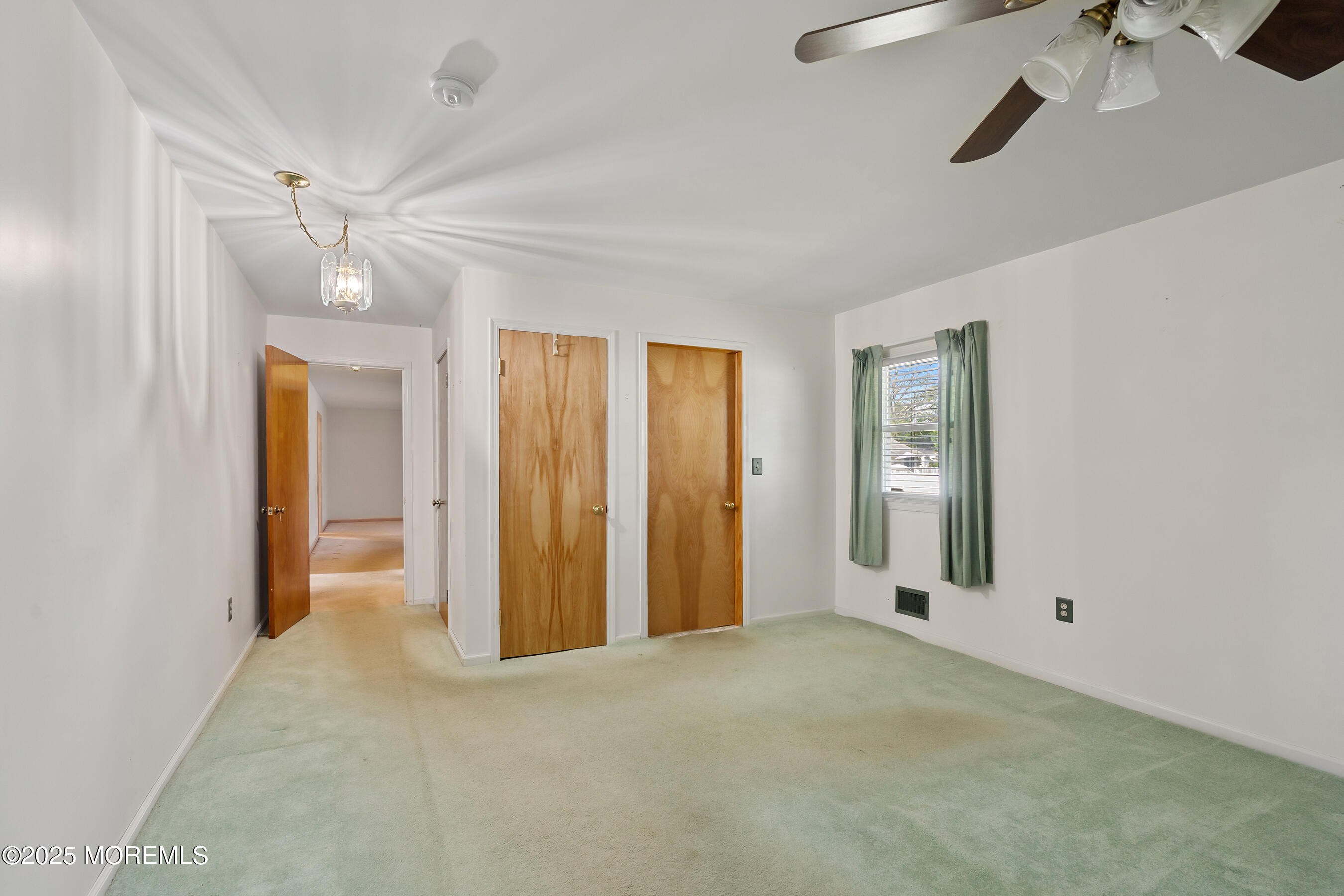 6 Kim Valley Road Hamilton, NJ 08620 - Photo 16 of 27 a view of an empty room with a window