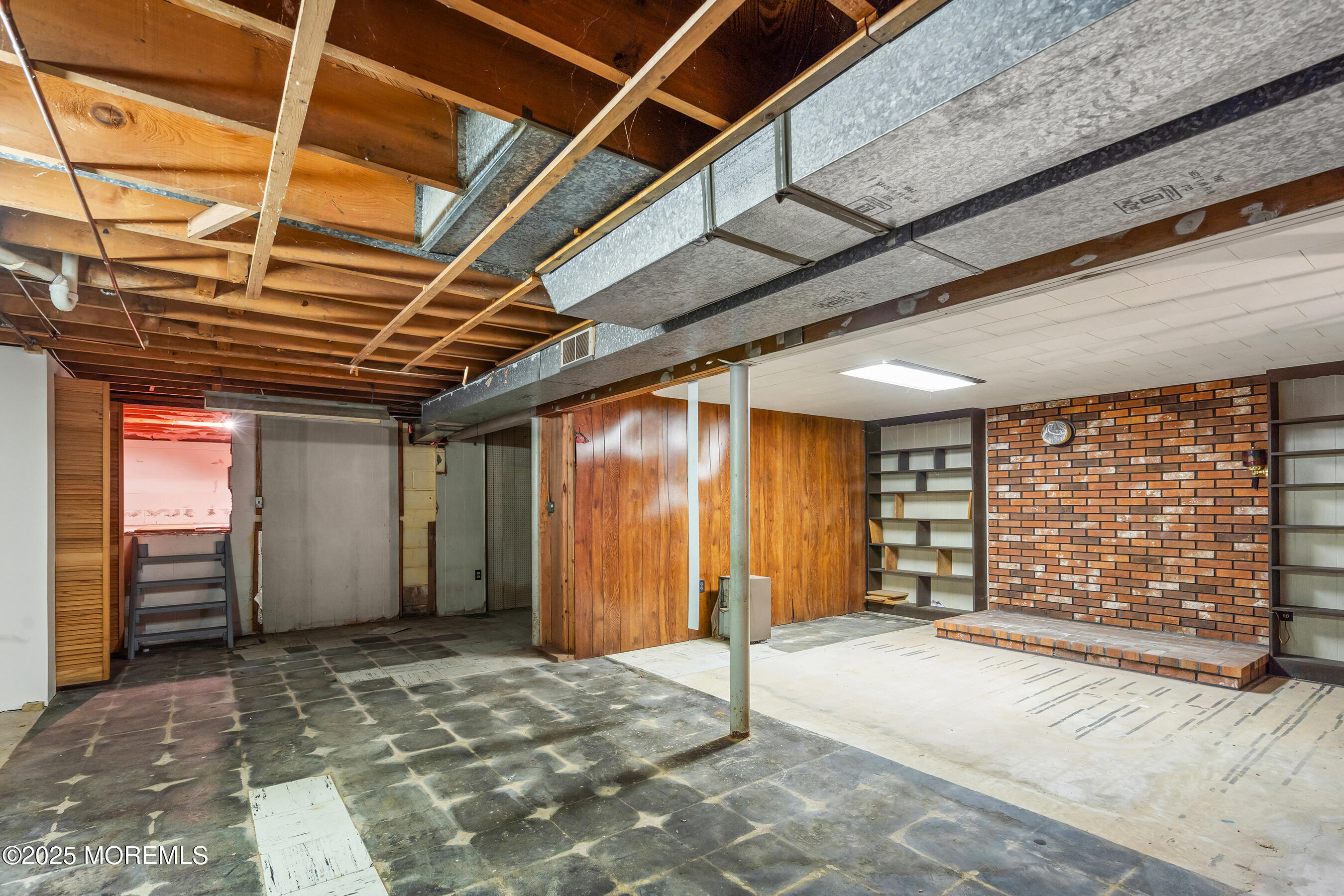 6 Kim Valley Road Hamilton, NJ 08620 - Photo 18 of 27 a view of an empty room with a garage
