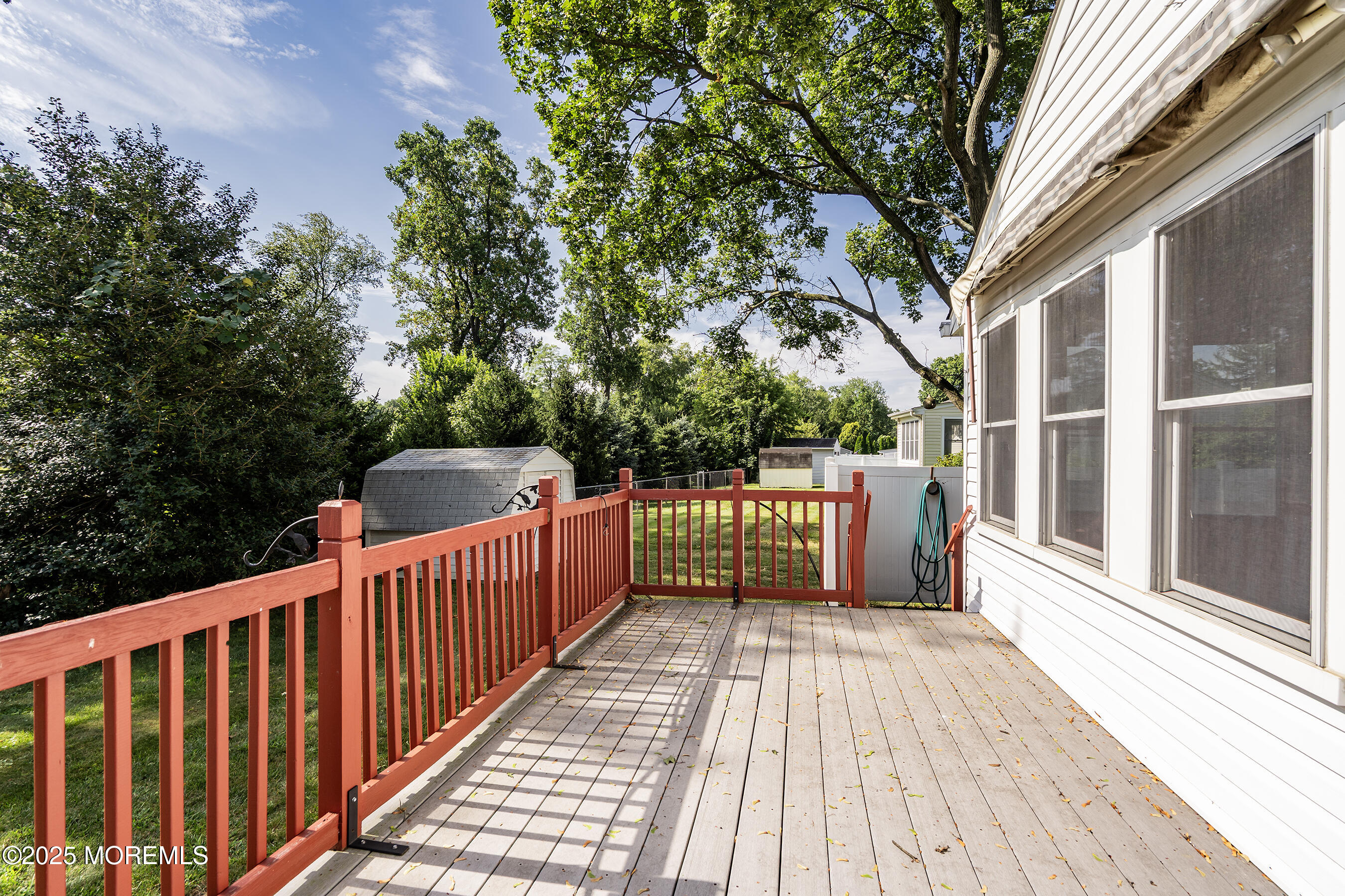 6 Kim Valley Road Hamilton, NJ 08620 - Photo 21 of 27 a view of deck with wooden floor and outdoor seating