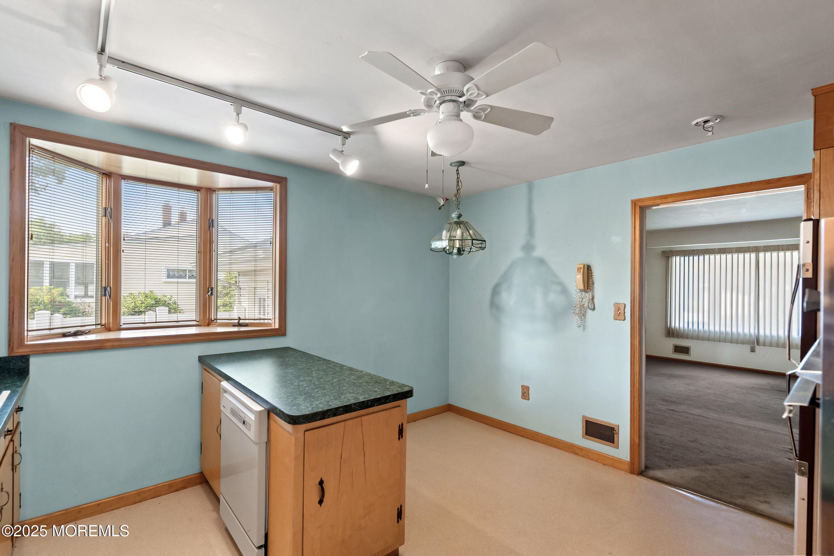 6 Kim Valley Road Hamilton, NJ 08620 - Photo 6 of 27 a view of a kitchen with a sink and cabinet area