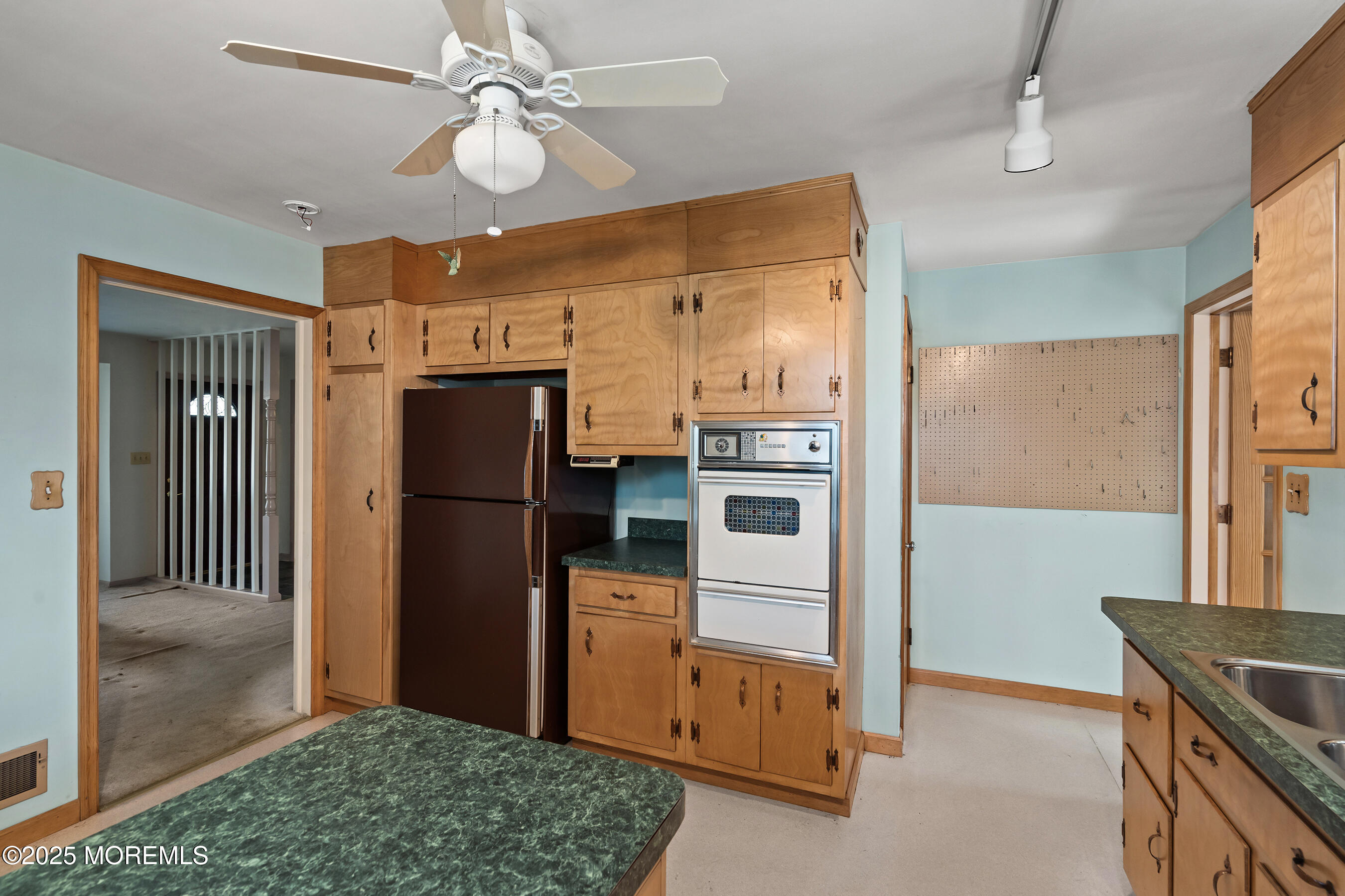 6 Kim Valley Road Hamilton, NJ 08620 - Photo 8 of 27 a kitchen with stainless steel appliances kitchen island granite countertop a refrigerator a stove and a sink with granite countertops