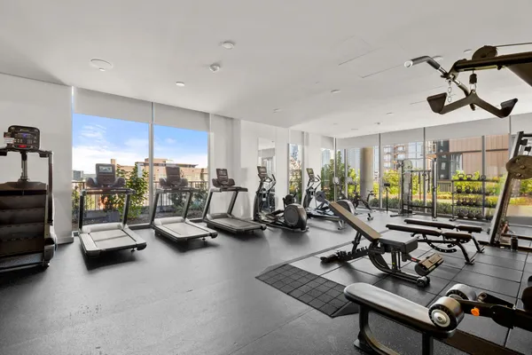 a view of a room with gym equipment
