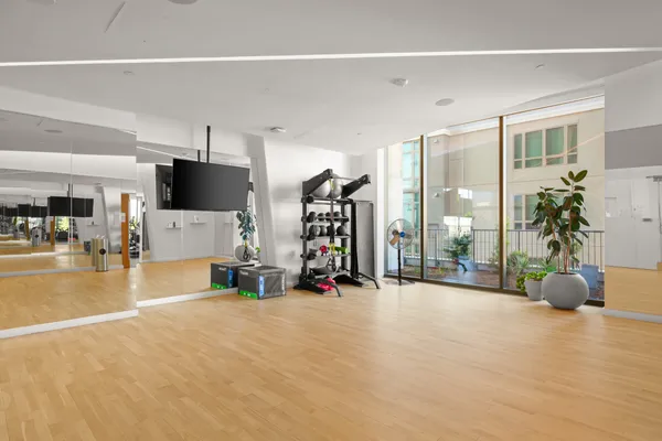 a view of a livingroom with furniture and a flat screen tv