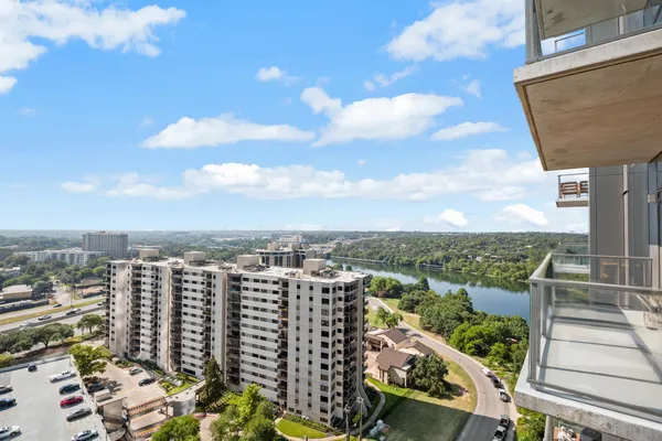 a view of a city with tall buildings