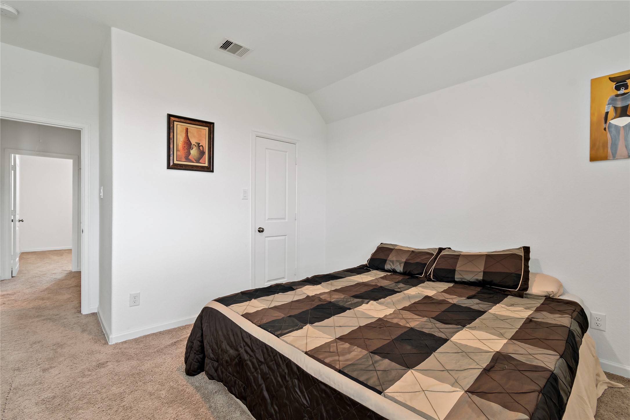 14010 Hartford Heights Way Rosharon, TX 77583 - Photo 11 of 30 a bedroom with a bed and a painting on the wall