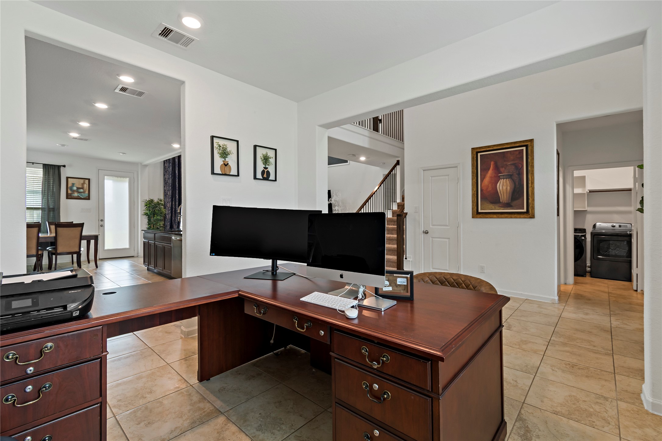 14010 Hartford Heights Way Rosharon, TX 77583 - Photo 25 of 30 a room with a workspace and a couch