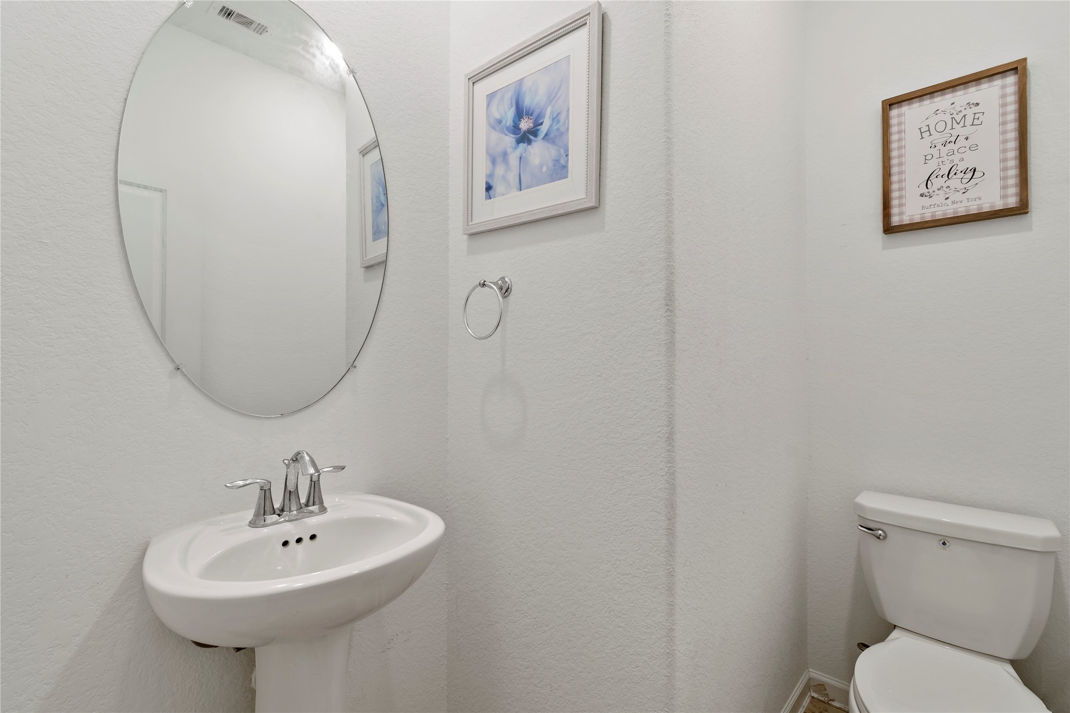 14010 Hartford Heights Way Rosharon, TX 77583 - Photo 27 of 30 a bathroom with a toilet a sink and a mirror