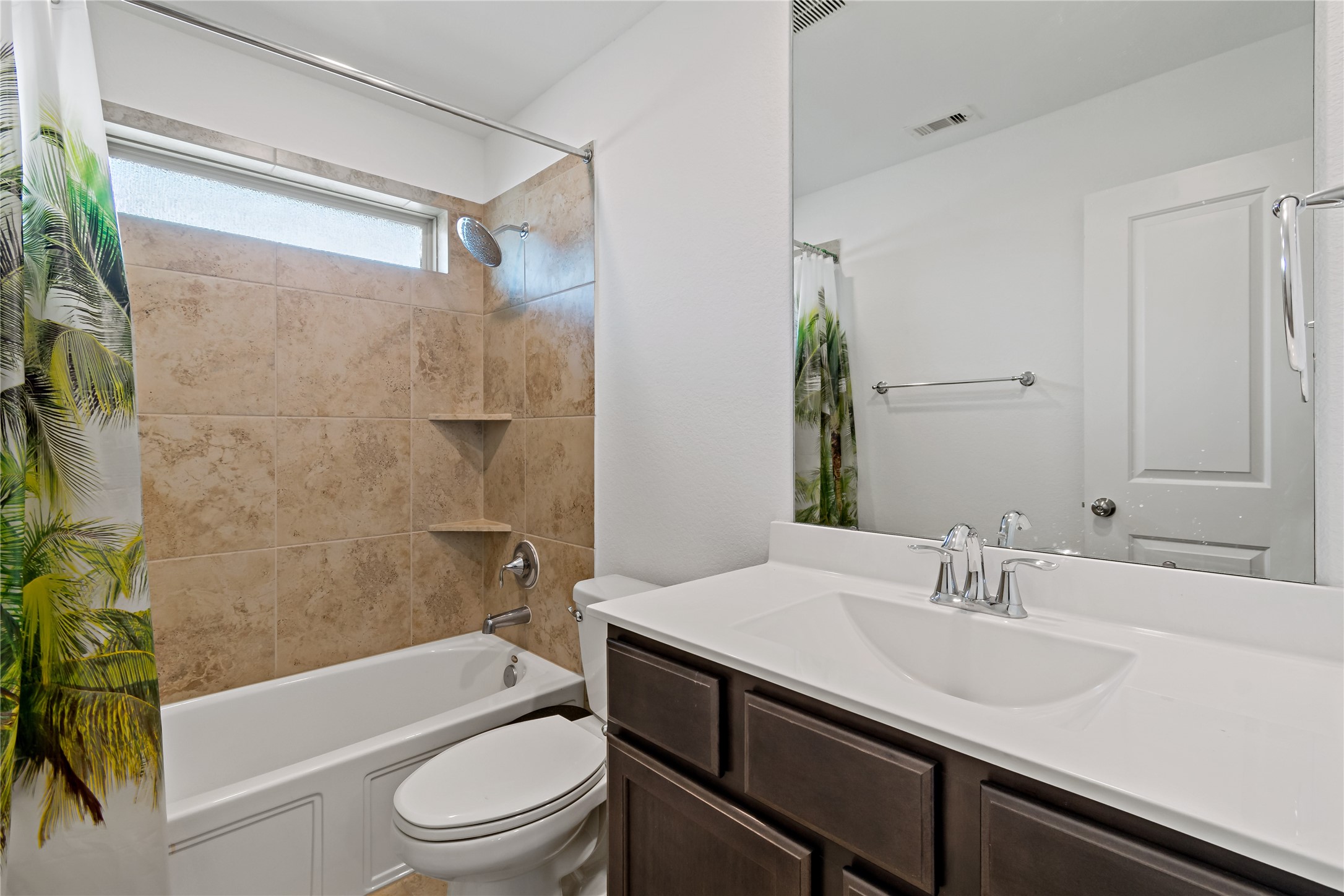 14010 Hartford Heights Way Rosharon, TX 77583 - Photo 10 of 30 a bathroom with a sink a toilet and a bathtub