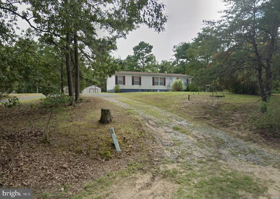 5460 Sandy Hill Road Quantico, MD 21856 - Photo 15 of 19 Charming home nestled in nature's embrace.