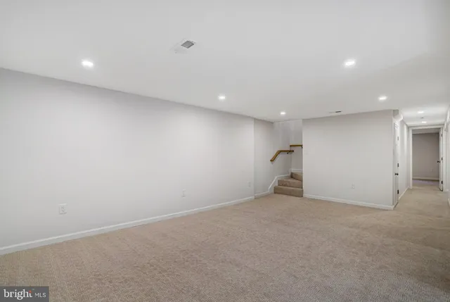 a utility room with sink dryer and washer