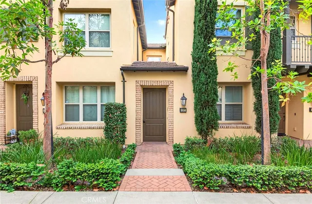 front view of a house with a small yard