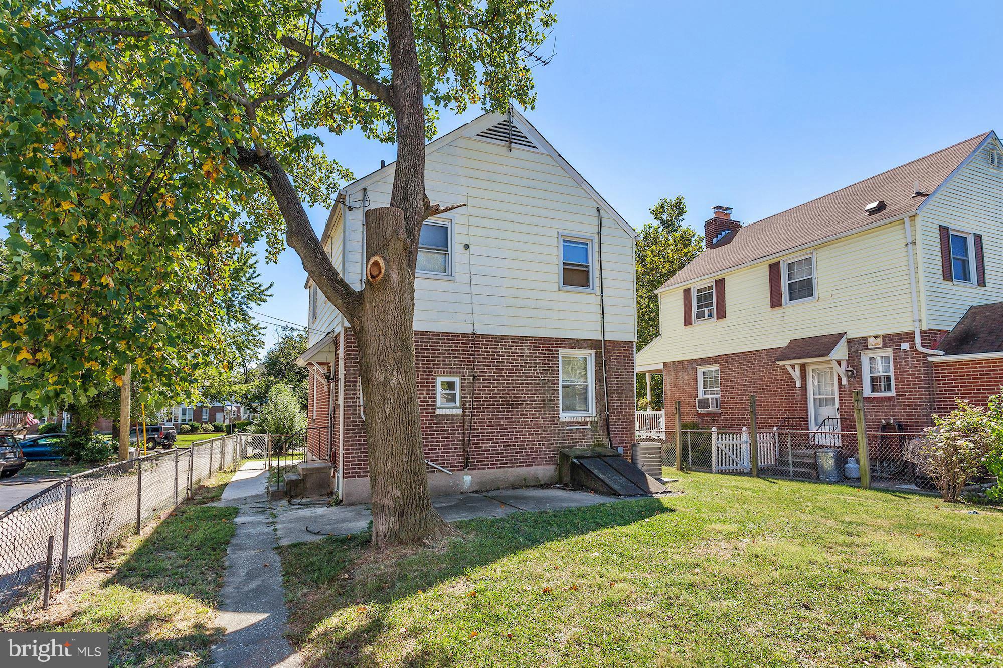 3127 Dunglow Road Baltimore, MD 21222 - Photo 13 of 14 front view of a house with a yard
