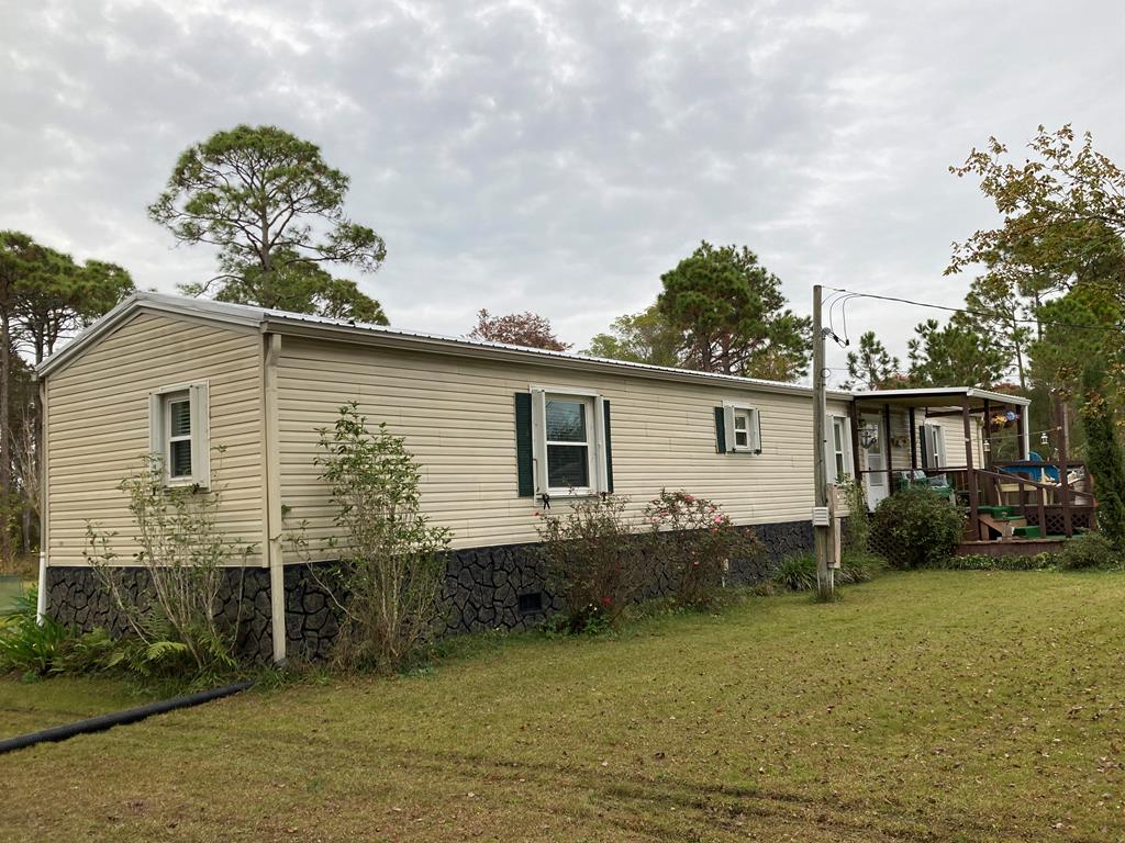 501 Tip Tucker Road Eastpoint, FL 32328 - Photo 1 of 55 Gallery Image 1