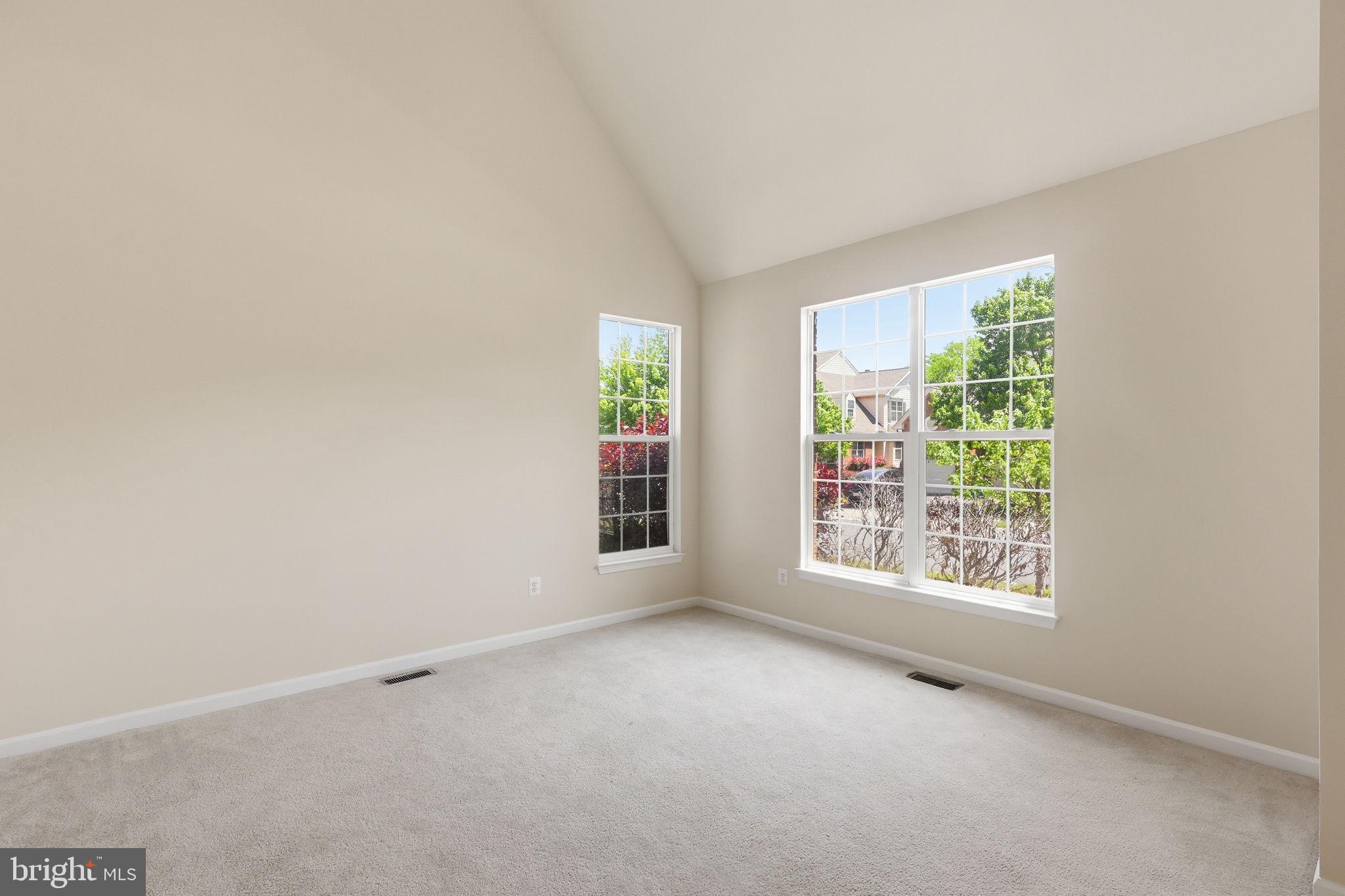 19617 Edgemont Square Ashburn, VA 20147 - Photo 7 of 65 an empty room with windows