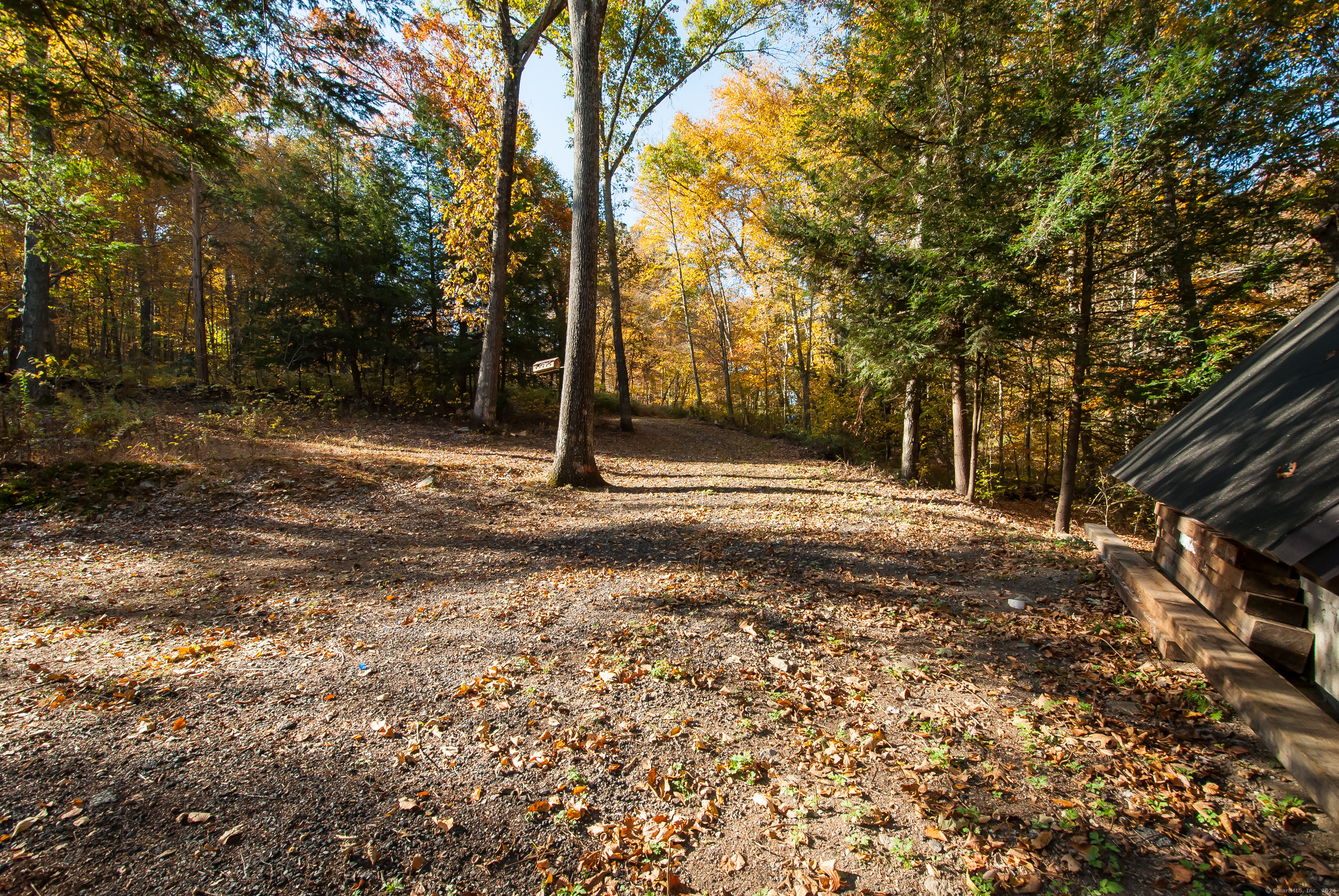 600 Berkshire Road Southbury, CT 06488 - Photo 6 of 27 a backyard of a house with lots of green space