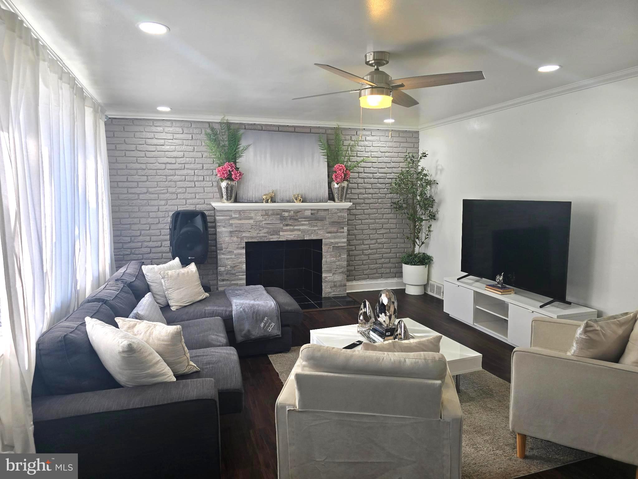 1303 Manor Road Lansdowne, PA 19050 - Photo 4 of 17 Modern living space with cozy elegance.