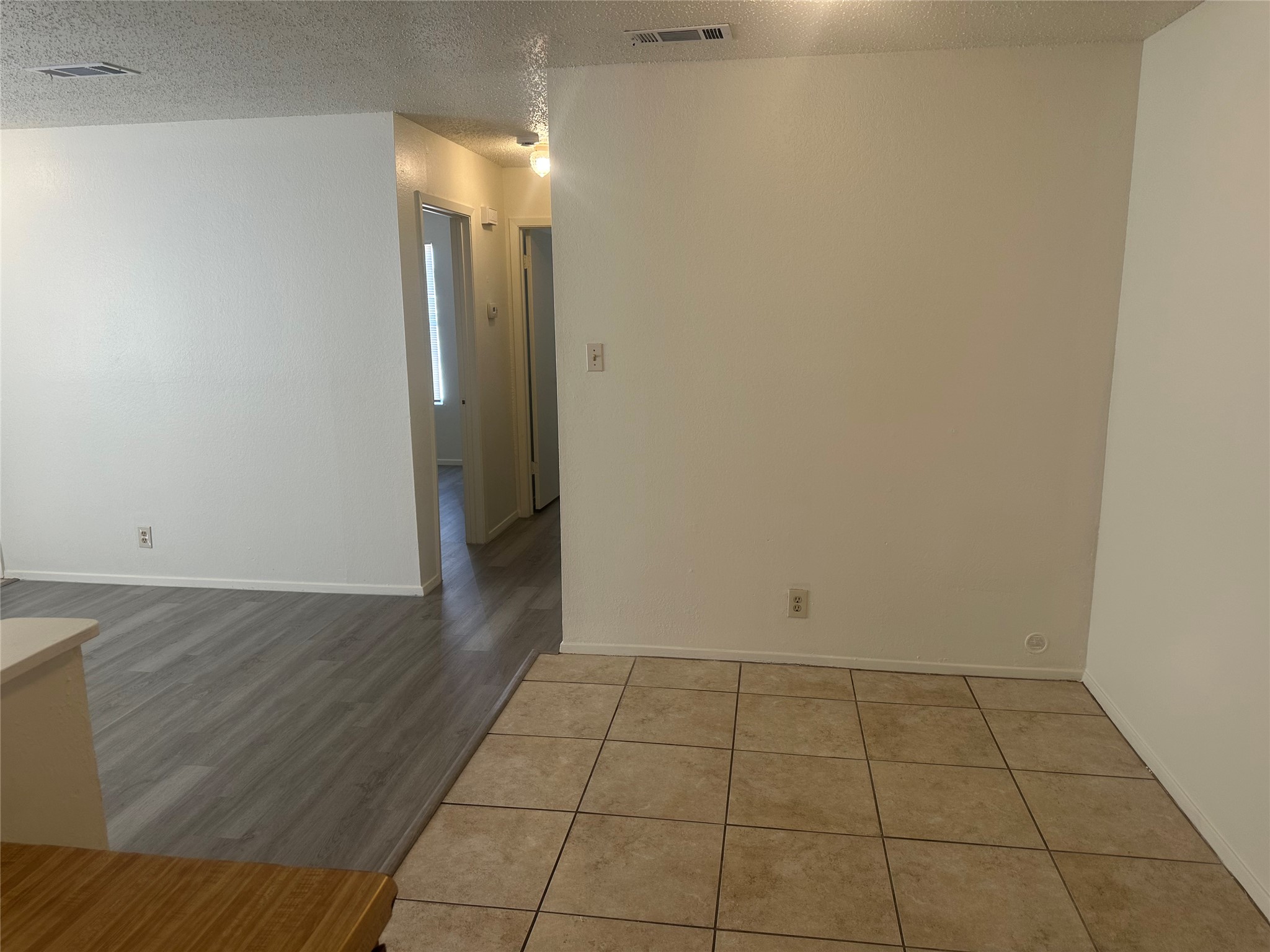 2602 South Bagdad Road, Unit B Leander, TX 78641 - Photo 23 of 23 An open floorplan seamlessly connects the tiled dining space to the main living area.