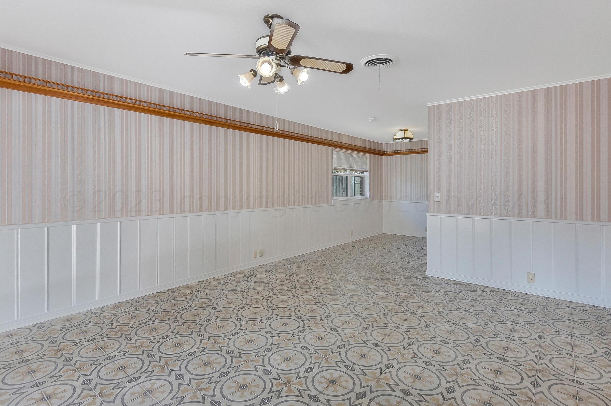 6017 Gainsborough Road Amarillo, TX 79106 - Photo 9 of 28 Den 2