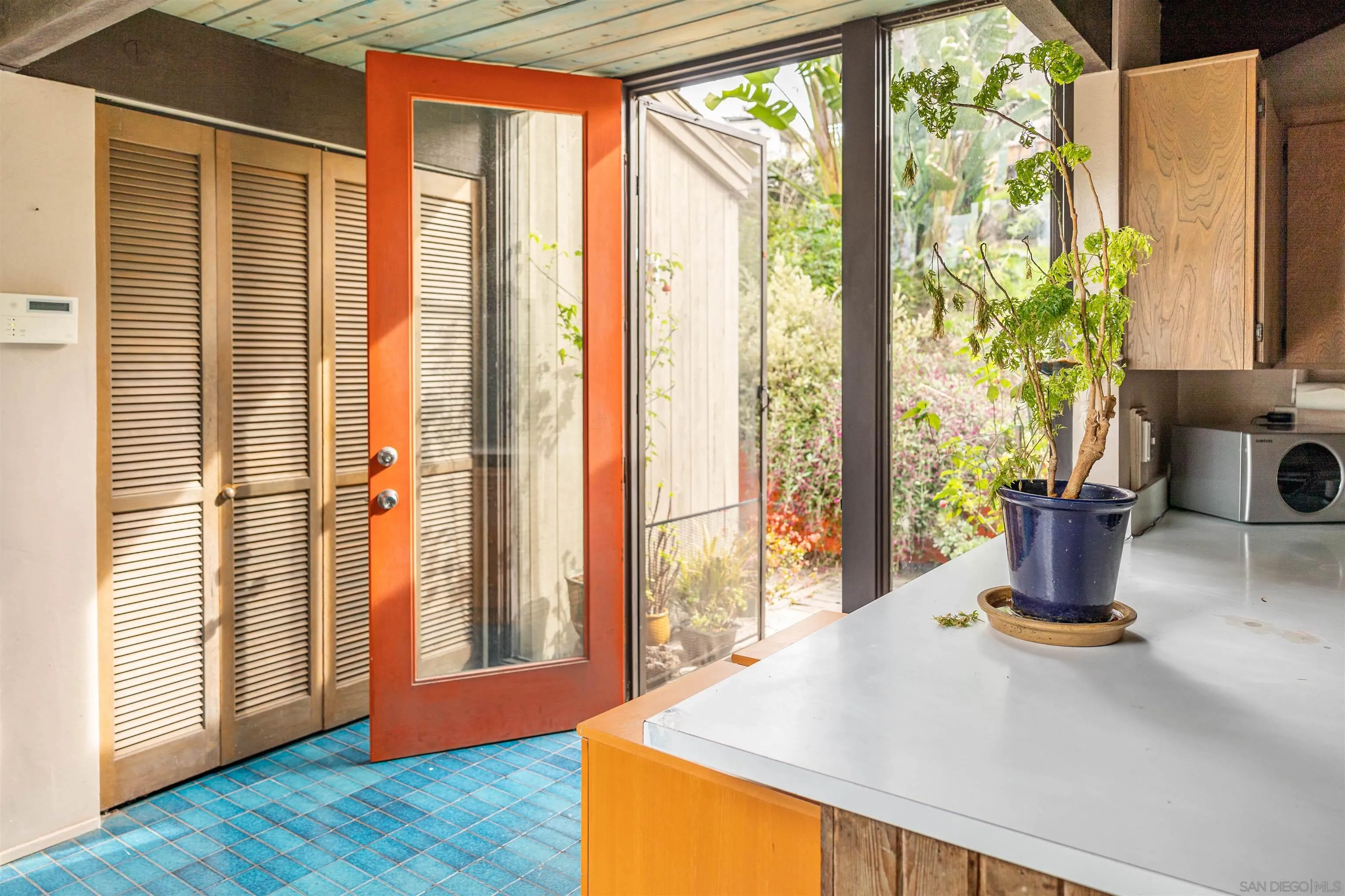 4291 Allen Road San Diego, CA 92103 - Photo 3 of 30 a kitchen with a large window