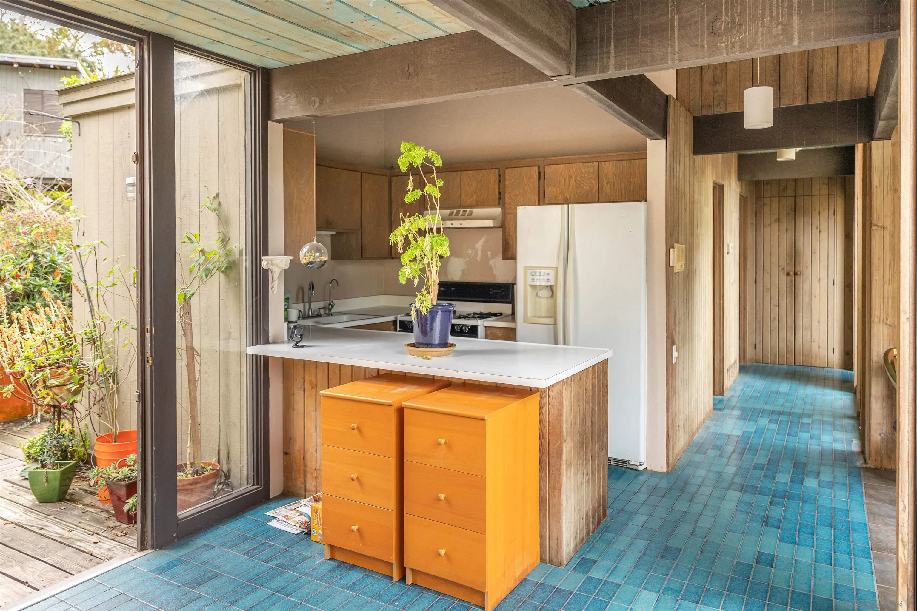 4291 Allen Road San Diego, CA 92103 - Photo 4 of 30 a kitchen with sink and refrigerator