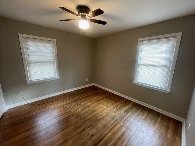 3602 Hallbrook Street Memphis, TN 38127 - Photo 8 of 12 Spare room with dark wood-type flooring and ceiling fan