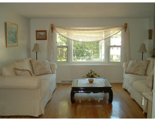 24 Russet Road Billerica, MA 01821 - Photo 2 of 13 a living room with furniture and a window
